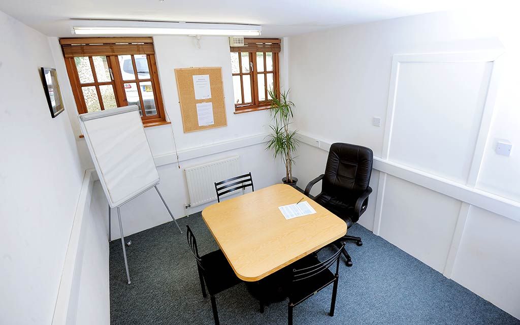 Office 8a with desk and chairs